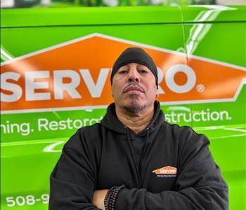 Crew Chief Raul Santos poses in front of our work van and air movers